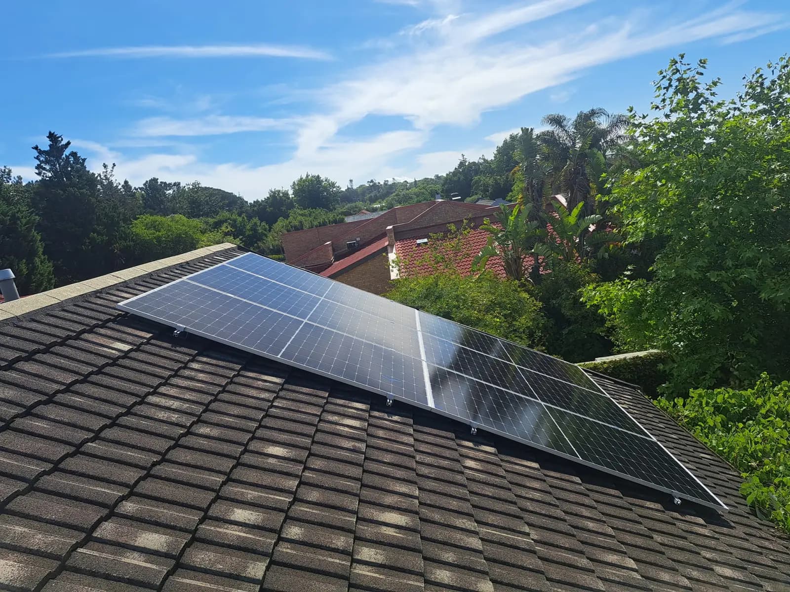 Solar panel array installed on a tiled roof in Cape Town's Northern Suburbs