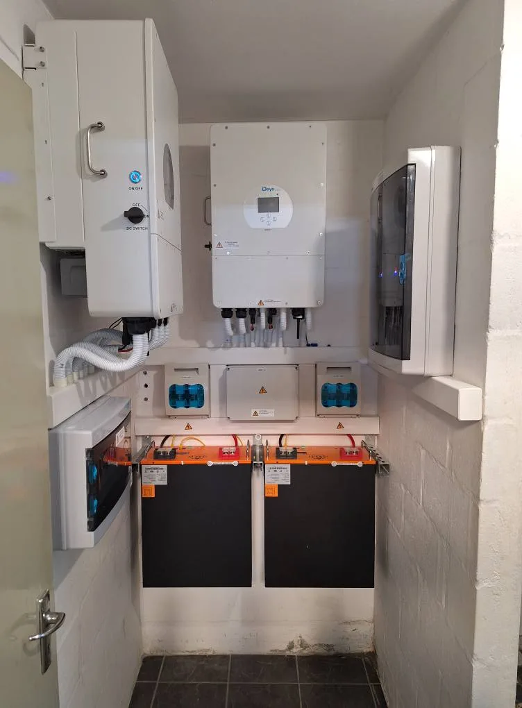 Electrical distribution board and inverter installation inspected for compliance